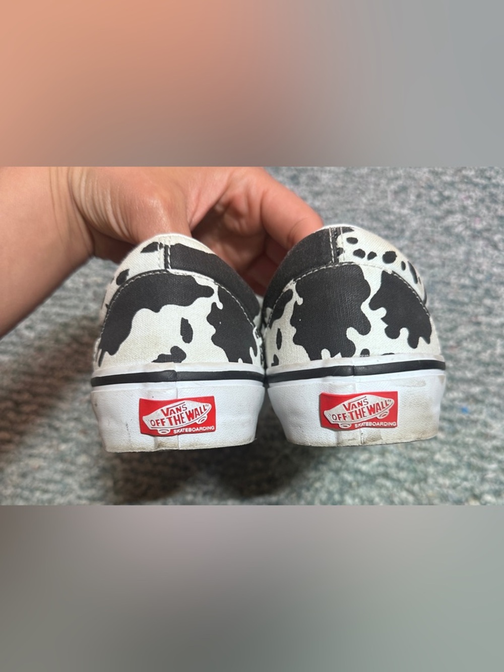 Vans Unisex Slip-On Sneakers in Black and White Cow Print - Picture 9 of 11